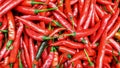 Red chillies background with selective focus on sale in a night market