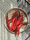 Red chillies on bamboo basket Royalty Free Stock Photo