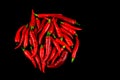 Red Chillis on Black Background Royalty Free Stock Photo