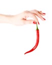 Red chilly pepper in hand isolated Royalty Free Stock Photo