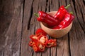 Red chilly pepper on wooden black background. Red hot chili peppers. Royalty Free Stock Photo