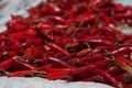 Red chilly peppers in a pile for sale Royalty Free Stock Photo