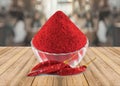 Red Chilly powder in a glass bowl with dried red chillies, Indian spices - Image Royalty Free Stock Photo