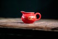 red Chinese gaiwan on an old wooden table Royalty Free Stock Photo