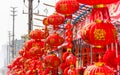 Red Chinese lantern and antithetical couplet for sales before lunar Chinese New year Royalty Free Stock Photo