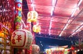 Chinese Opera mask hanging in a row during day time for Chinese new year or Luna New Year celebration view Royalty Free Stock Photo