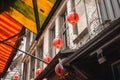 Red Chinese Lanterns above Awnings