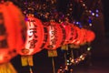 Red Chinese lanternTranslation Hieroglyph text Happy New Year hanging in a row during day time for Chinese new year celebration Royalty Free Stock Photo