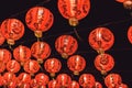 Red Chinese lanternTranslation Hieroglyph text Happy New Year hanging in a row during day time for Chinese new year celebration Royalty Free Stock Photo