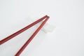 Red chopsticks on a chopstick rest Royalty Free Stock Photo