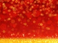 Red Christmas Background with Golden glitter or bokeh lights. Royalty Free Stock Photo