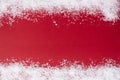 Red christmas background with snow borders. Winter, Christmas mockup. Copy space