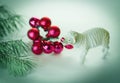 Red Christmas ball .Christmas tree branch and a toy lamb.isolat Royalty Free Stock Photo