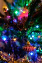 Red Christmas ball decoration on a Christmas tree with nice blurry background