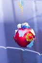 Red Christmas ball at the handmade festival in Moscow, Russia Royalty Free Stock Photo