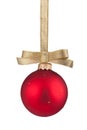 Red Christmas ball hanging on golden ribbon Royalty Free Stock Photo