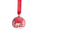 Red Christmas ball hanging on ribbon Isolated Royalty Free Stock Photo