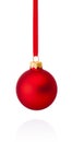 Red Christmas ball hanging on ribbon Isolated on white background Royalty Free Stock Photo