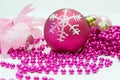 Red Christmas Ball and Pink Christmas-Tree Decorations Royalty Free Stock Photo