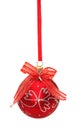 Red christmas ball with ribbon and bow on white Royalty Free Stock Photo