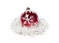 Red Christmas ball and silver tinsel isolated on white background Royalty Free Stock Photo