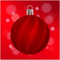 Red Christmas ball with Stripes, isolated Red Background with Bokeh Effect