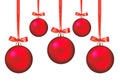 Red Christmas balls with bows on white Royalty Free Stock Photo