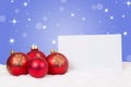 Red Christmas balls card for wishes with copyspace Royalty Free Stock Photo