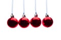 Red christmas balls hanging in a row on white background Royalty Free Stock Photo