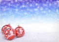 Red christmas balls on snow with bokeh background. 3D render