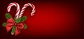 Red Christmas banner with candy canes.