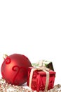 Red Christmas bauble and gifts Royalty Free Stock Photo