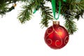 A red Christmas bauble hanging from garland Royalty Free Stock Photo