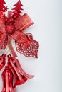 Red christmas bell decoration hanging on white Royalty Free Stock Photo