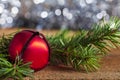 Red Christmas Bell with Pine Bough and Bokeh Royalty Free Stock Photo