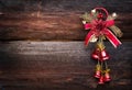 Red christmas bells on wood background. Xmas toy Royalty Free Stock Photo