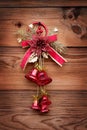 Red christmas bells on wood background. Xmas toy Royalty Free Stock Photo