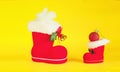Red Christmas boot with gift on background Royalty Free Stock Photo
