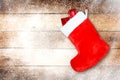 Red christmas boot with gifts on background Royalty Free Stock Photo