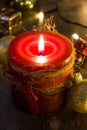 Red Christmas candle and Christmas ornaments Royalty Free Stock Photo