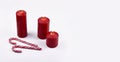 Red christmas candles with Candy cane stock images Royalty Free Stock Photo