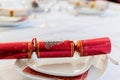 Red Christmas cracker on the Christmas table Royalty Free Stock Photo