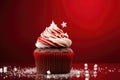 Red christmas cupcake, candy cane and christmas decoration. AI generated Royalty Free Stock Photo