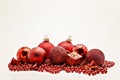 red Christmas decoration, balls, beads, bell close up isolated Royalty Free Stock Photo