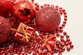 red Christmas decoration, balls, beads, bell close up isolated Royalty Free Stock Photo