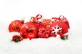 Red christmas decoration on snow Royalty Free Stock Photo