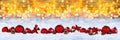 Red christmas decoration snow golden bokeh background Royalty Free Stock Photo