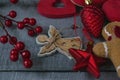 Red Christmas decorations on dark wood surface, Christmas decorations for Christmas tree Royalty Free Stock Photo