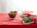 Red Christmas dinner table setup Royalty Free Stock Photo