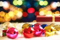 Red Christmas gift box and bokeh on background Royalty Free Stock Photo